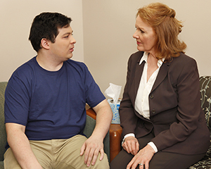 Man talking to mental health professional.